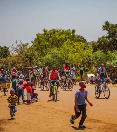 Kids running and biking in the street